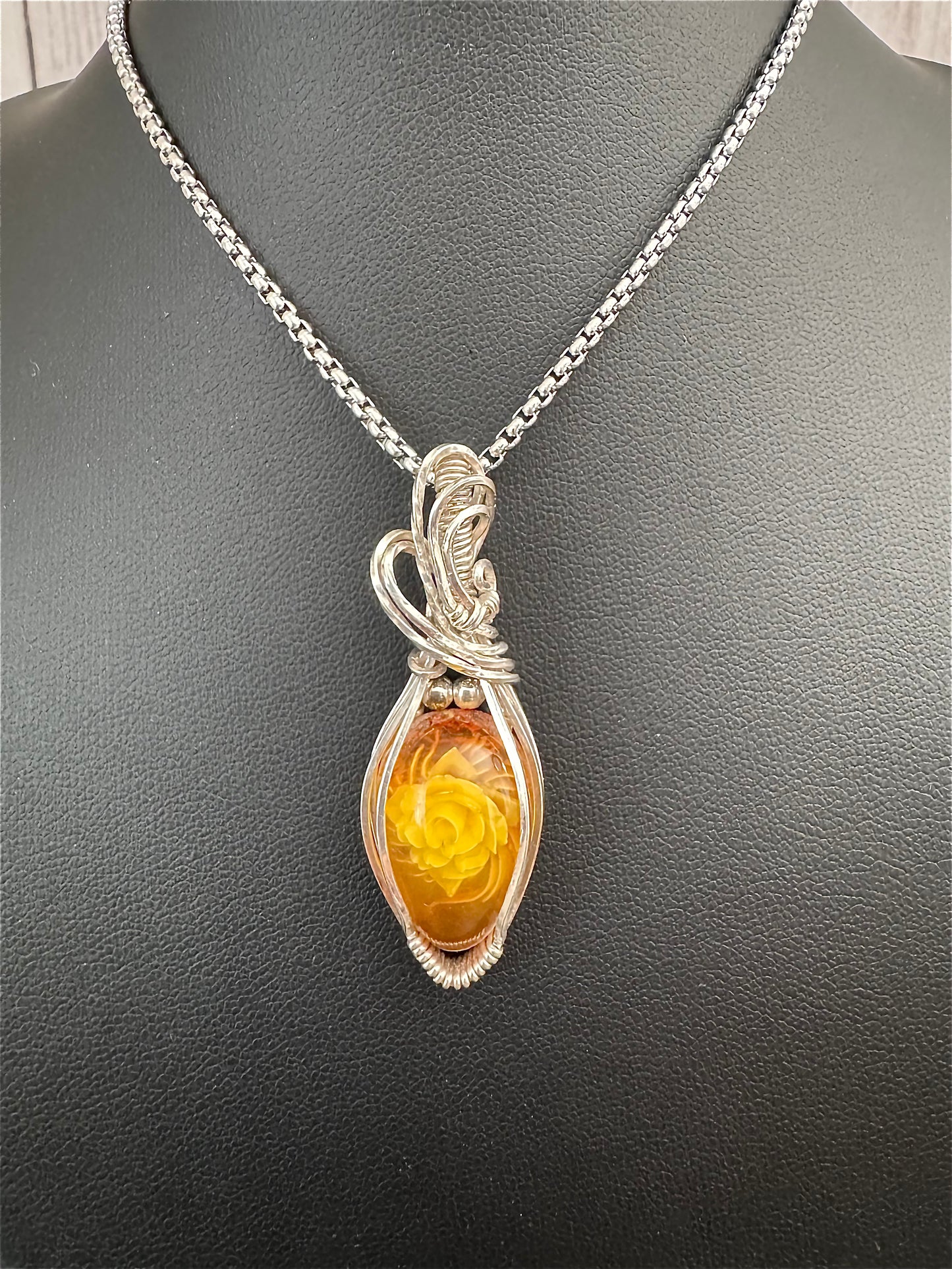 Carved Rose Amber necklace pendant