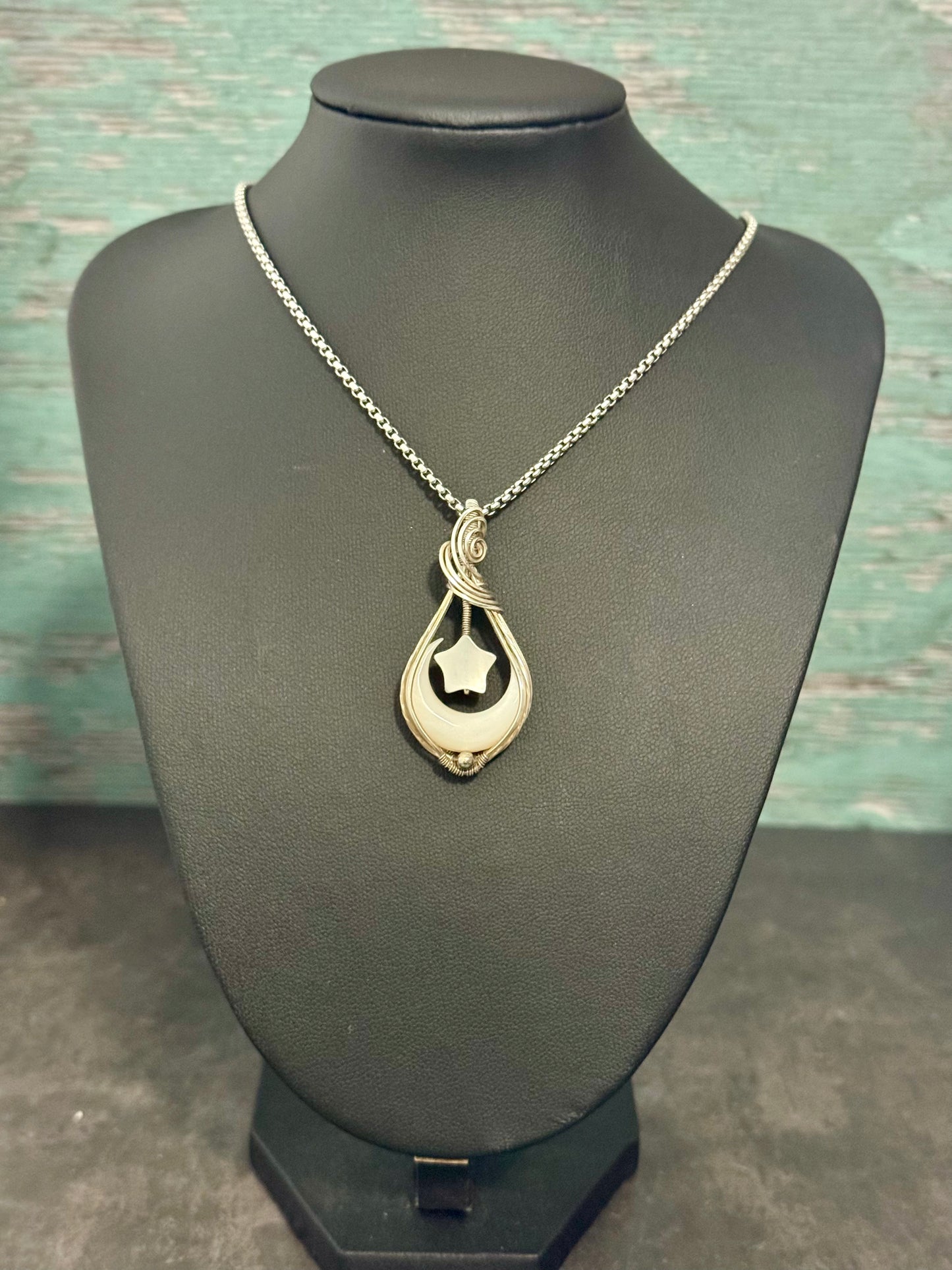 Crescent moon pendant