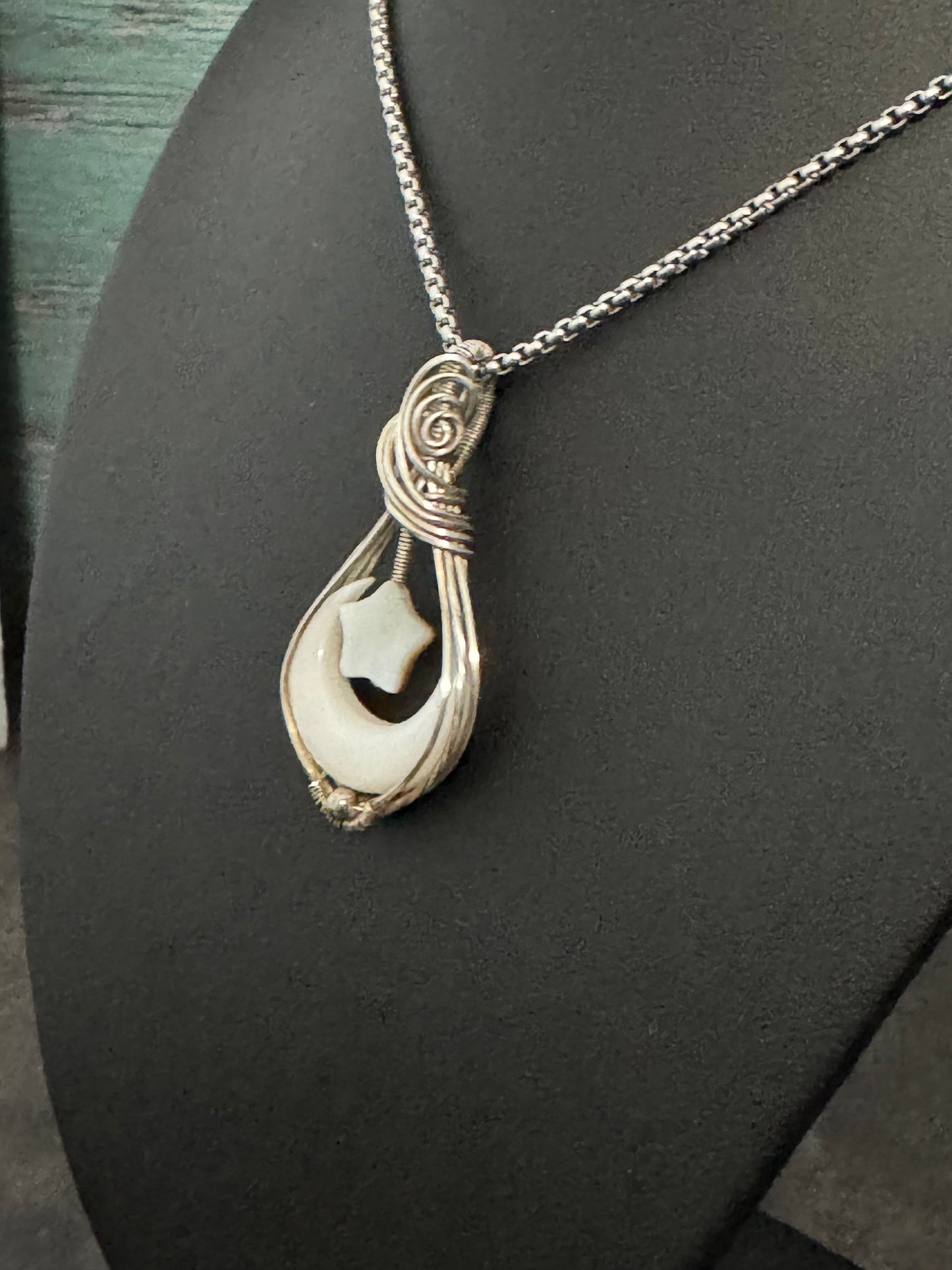 Crescent moon pendant