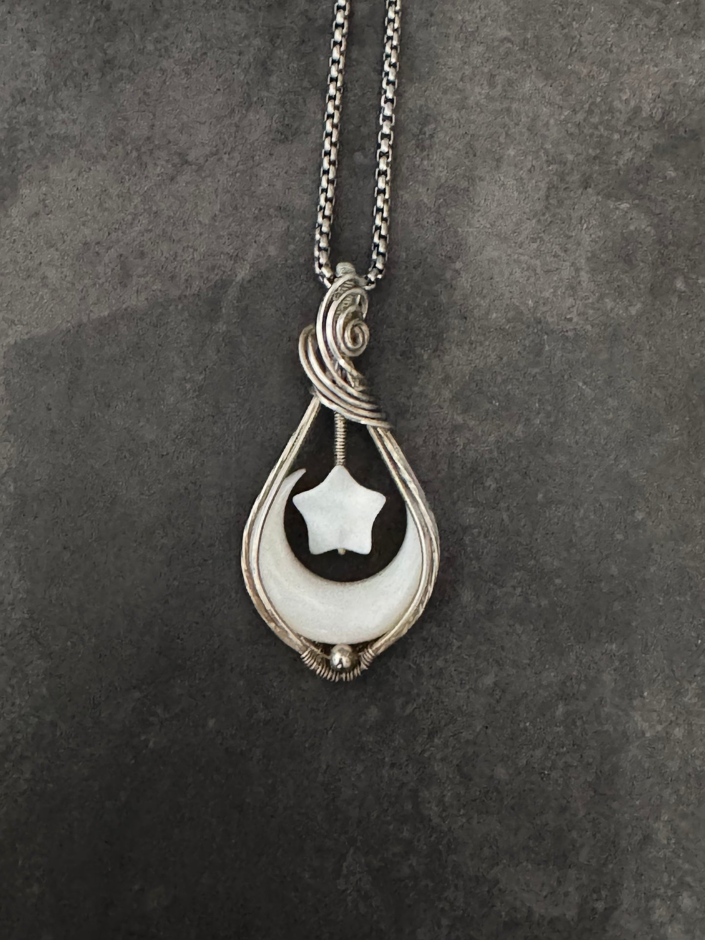 Crescent moon pendant