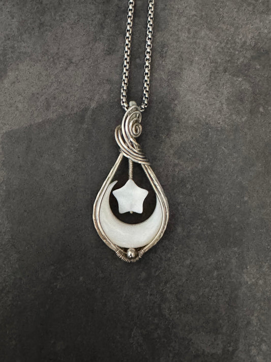 Crescent moon pendant