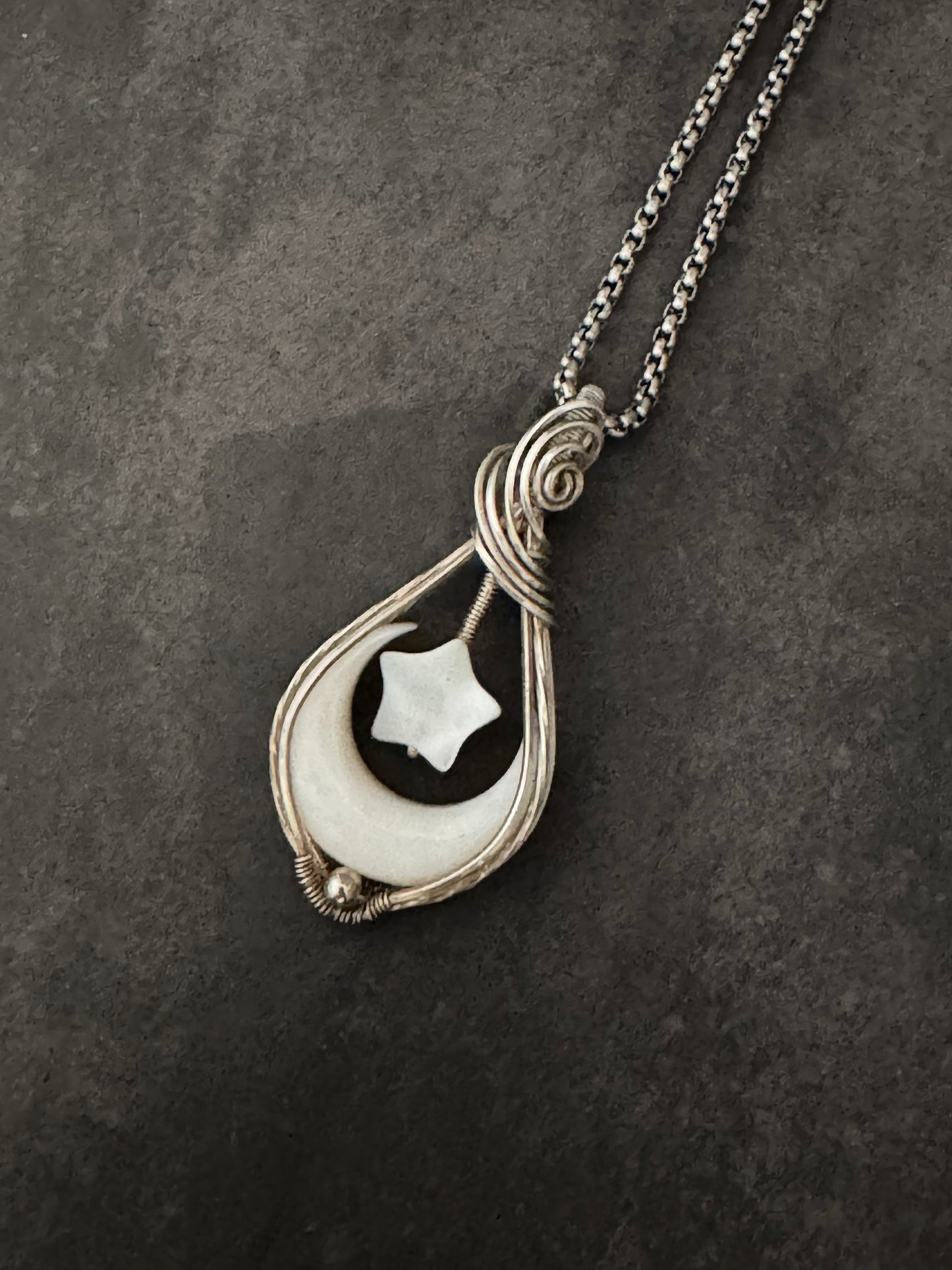 Crescent moon pendant