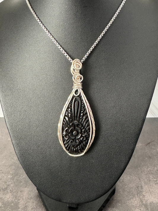 Carved Buffalo horn pendant necklace