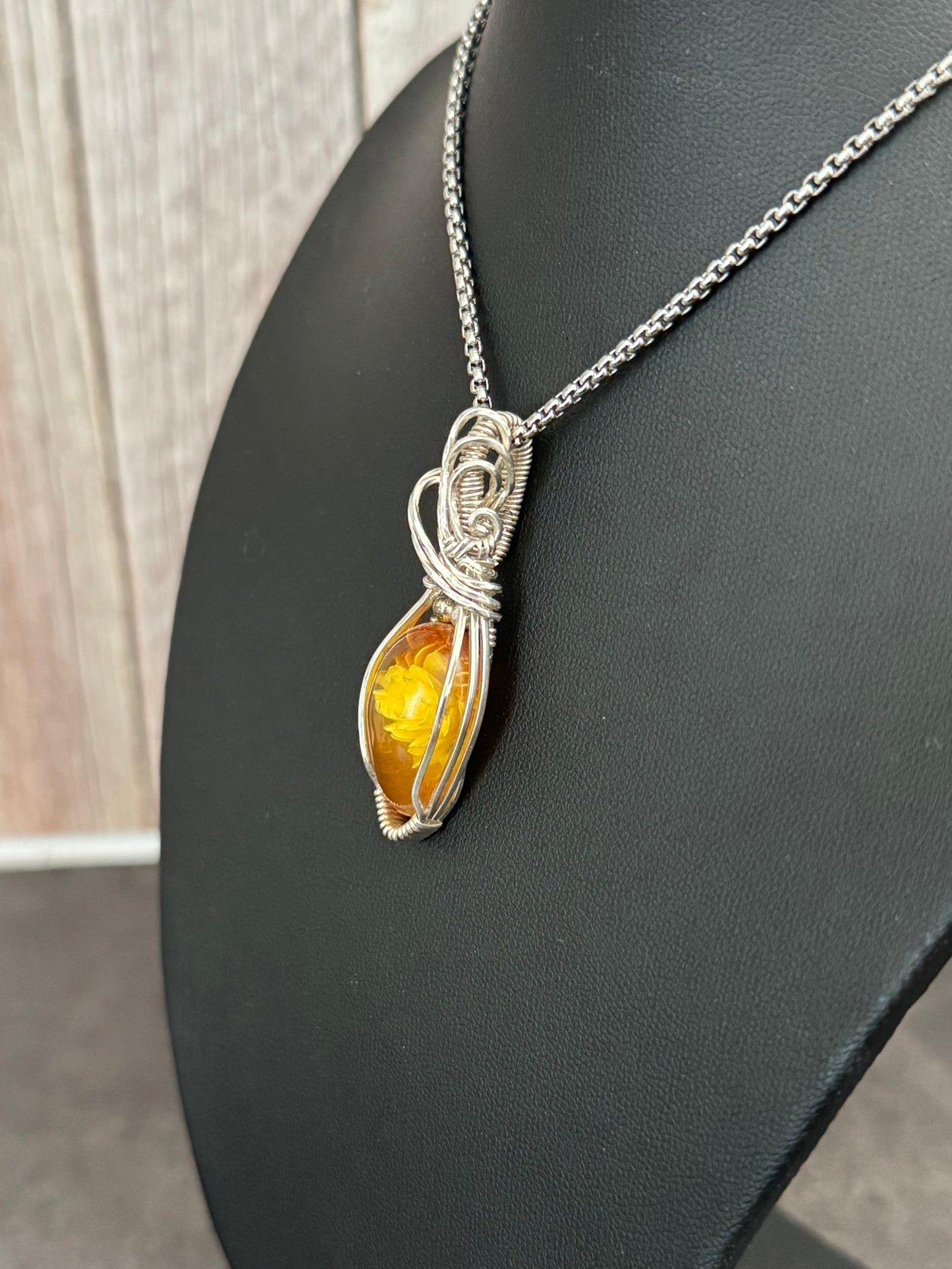 Carved Rose Amber necklace pendant