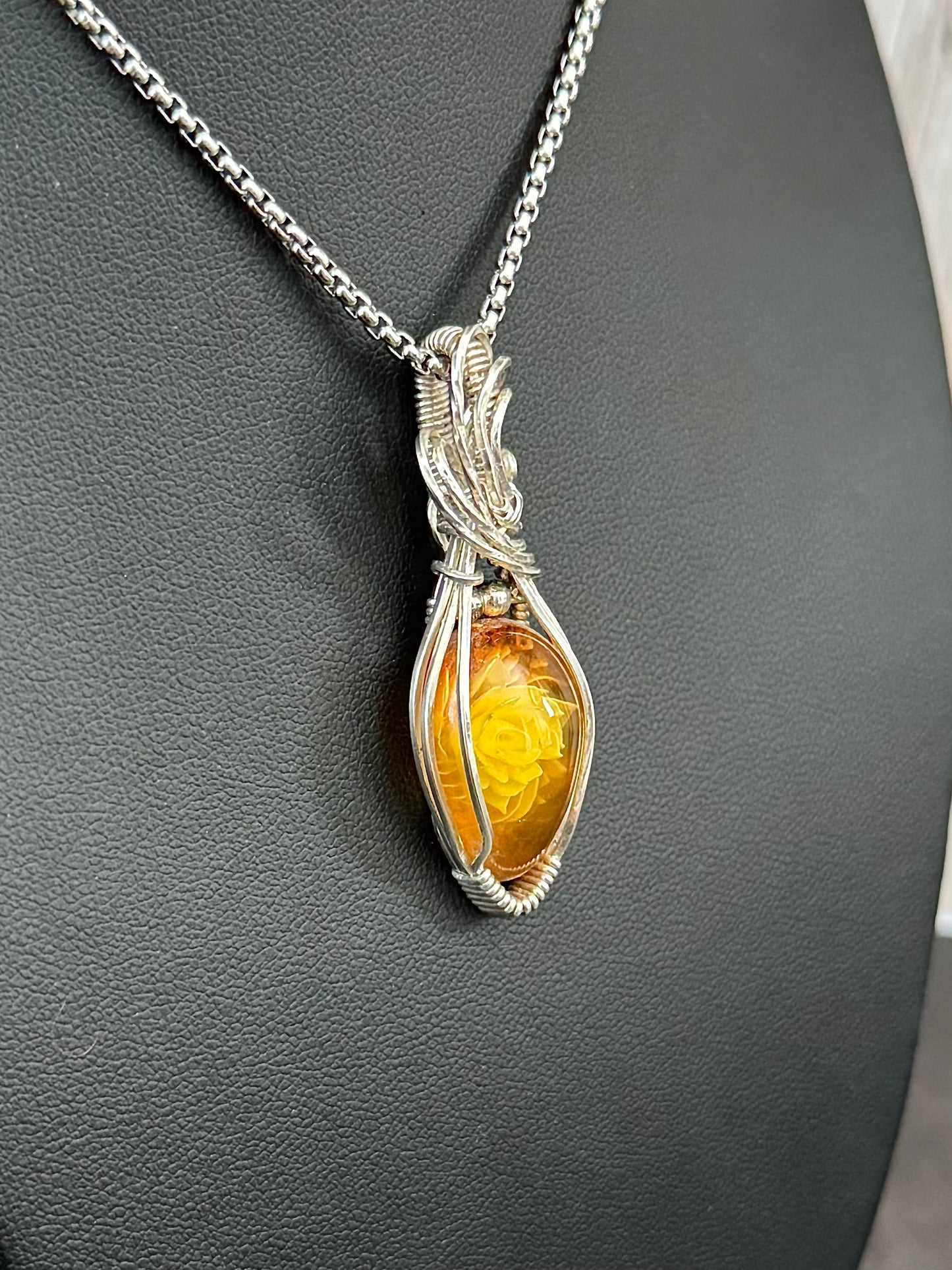 Carved Rose Amber necklace pendant