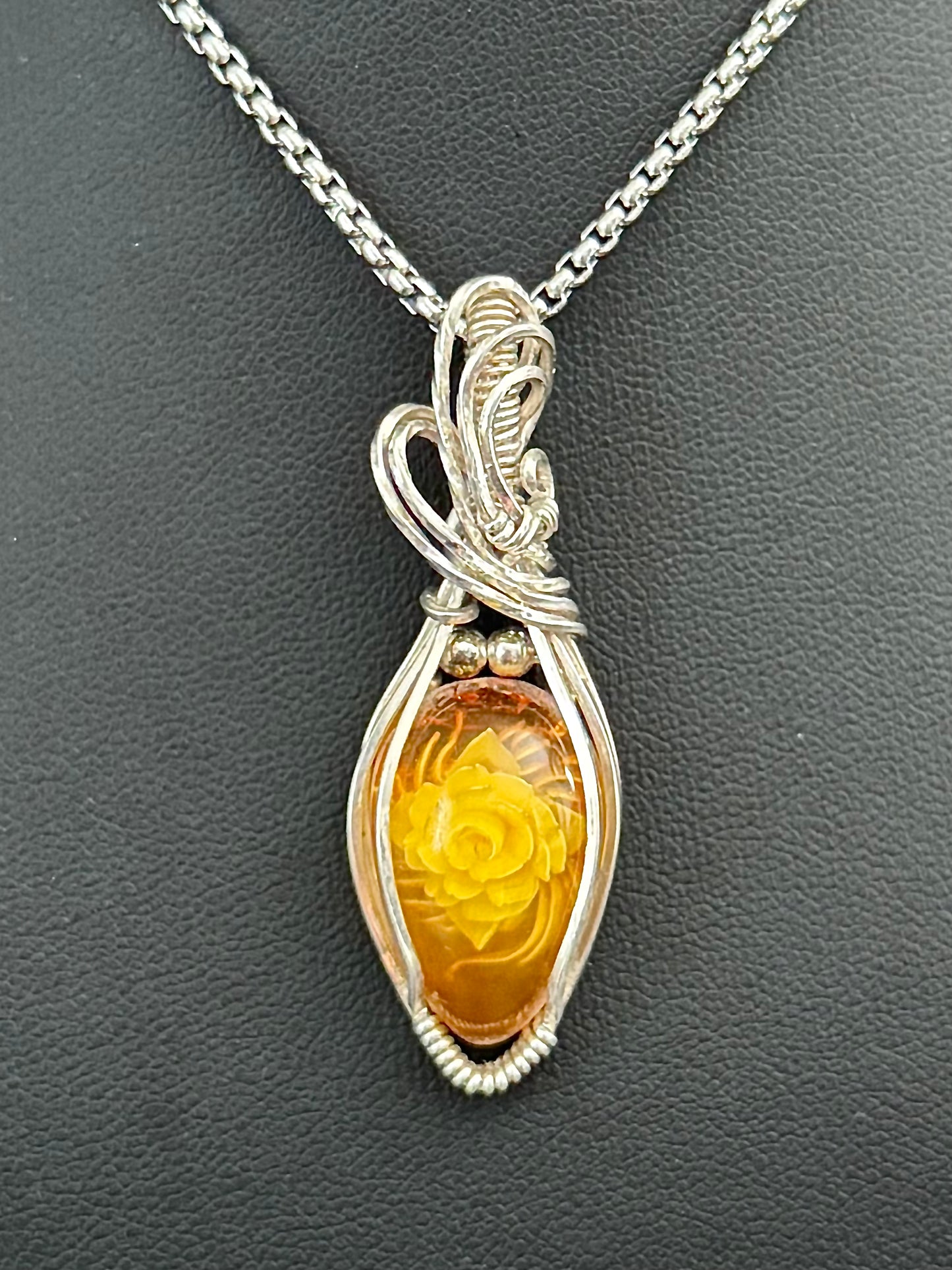 Carved Rose Amber necklace pendant