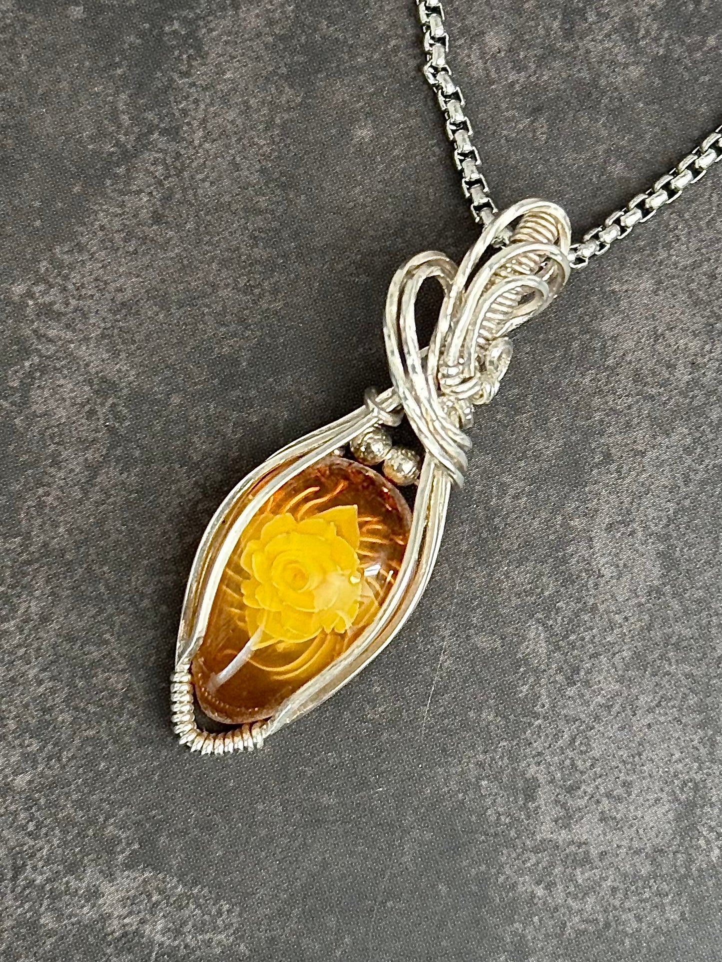 Carved Rose Amber necklace pendant