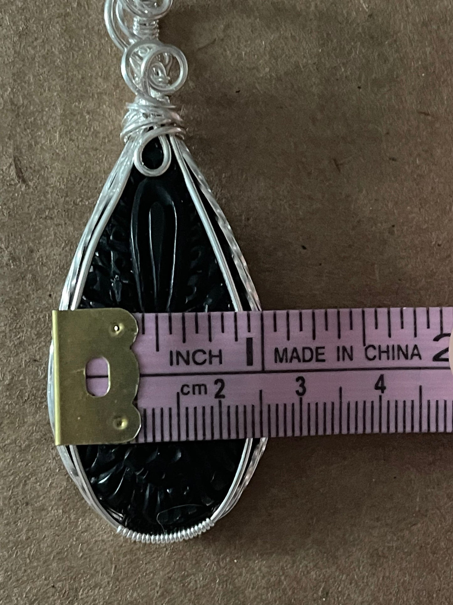 Carved Buffalo horn pendant necklace